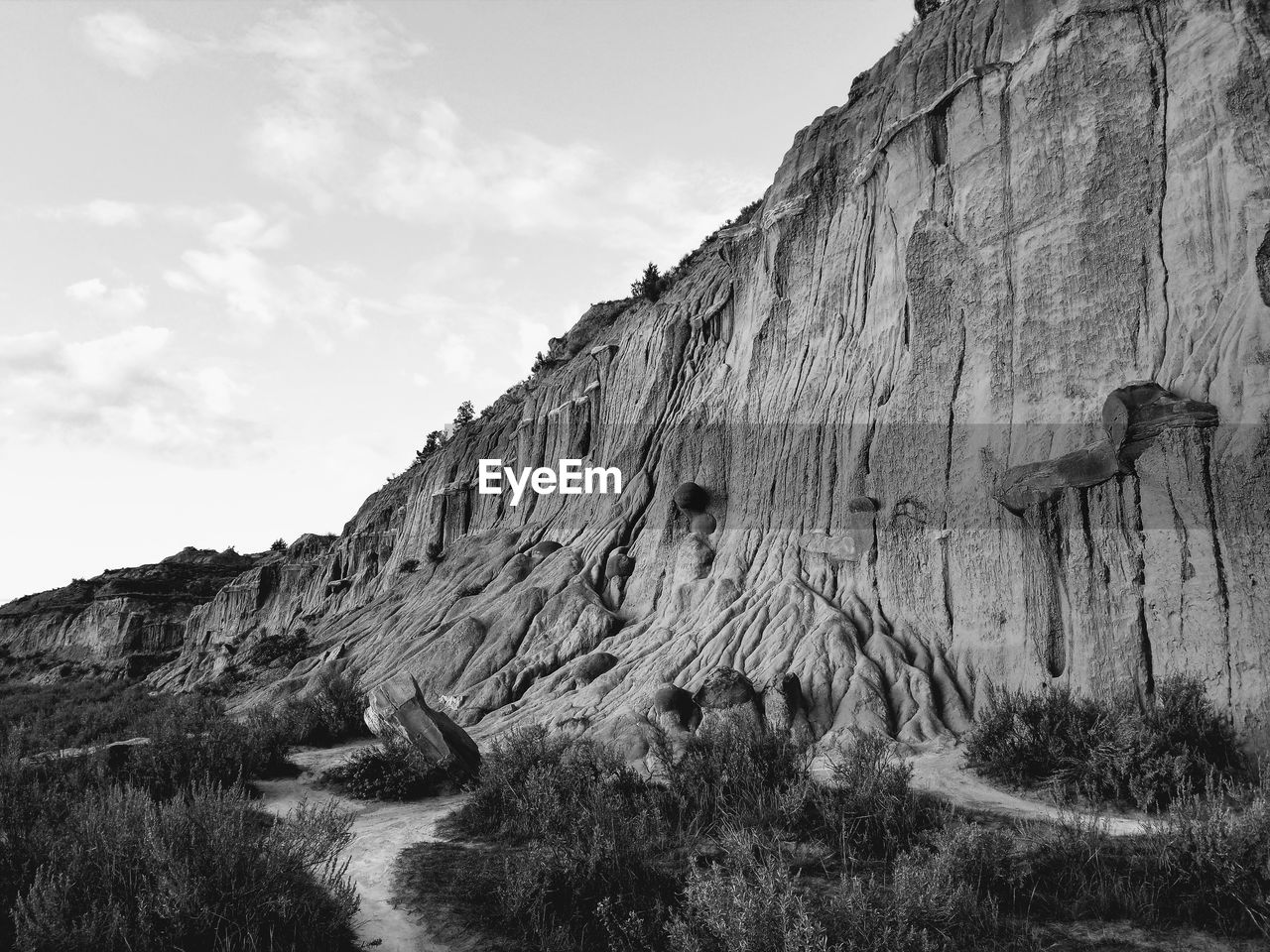 LOW ANGLE VIEW OF ROCK FORMATIONS ON LAND