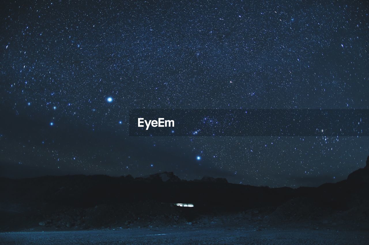 Scenic view of star field against star field at night