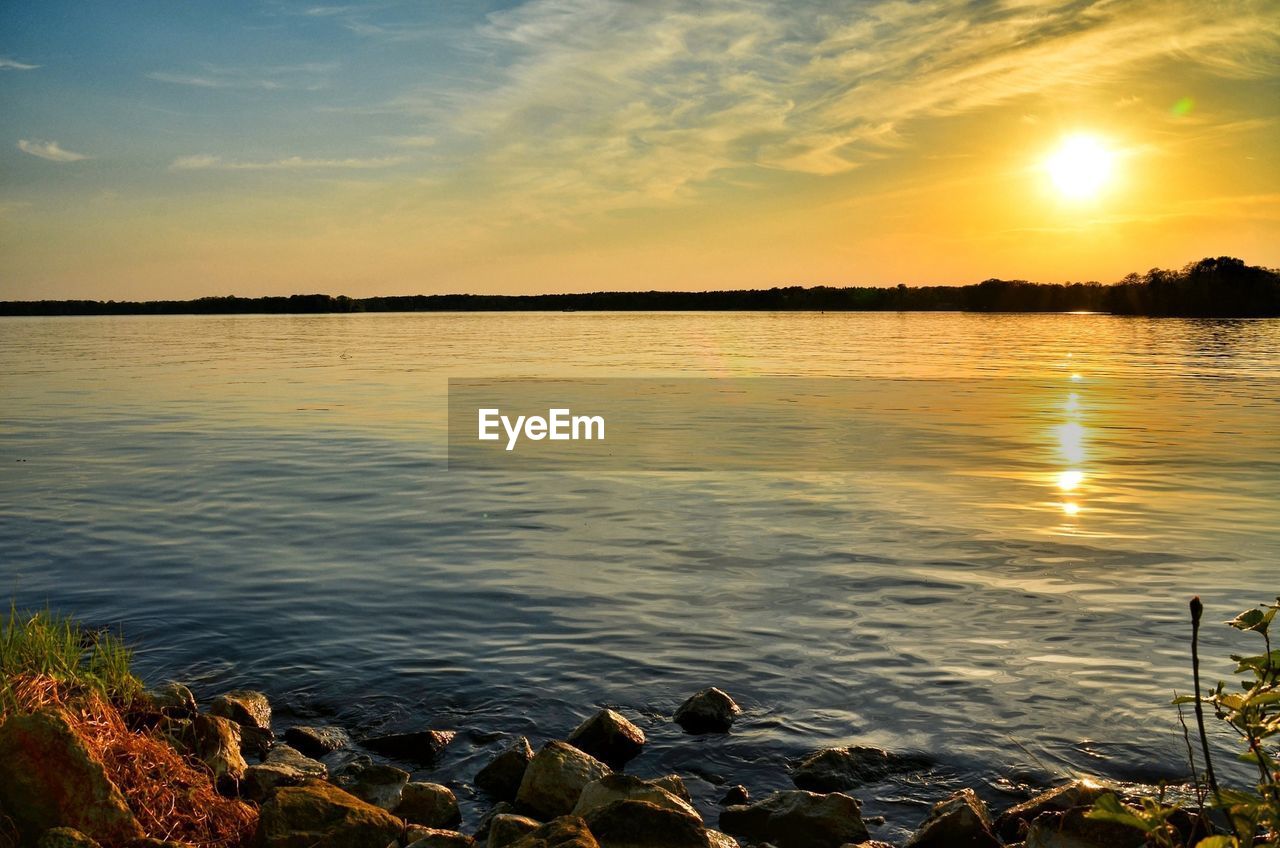 View of calm sea at sunset