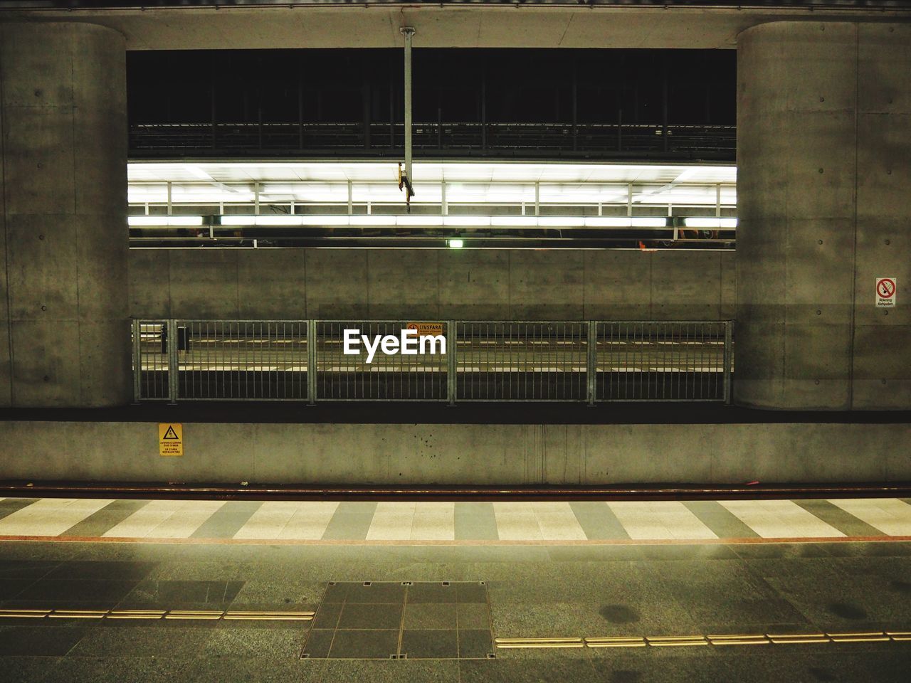 RAILROAD STATION AT NIGHT