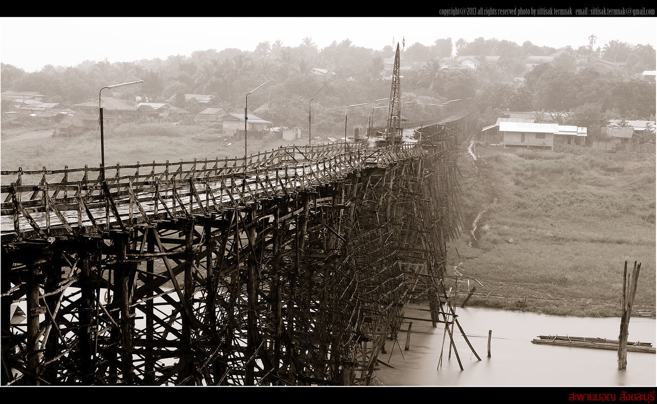 Wooden bridge over river