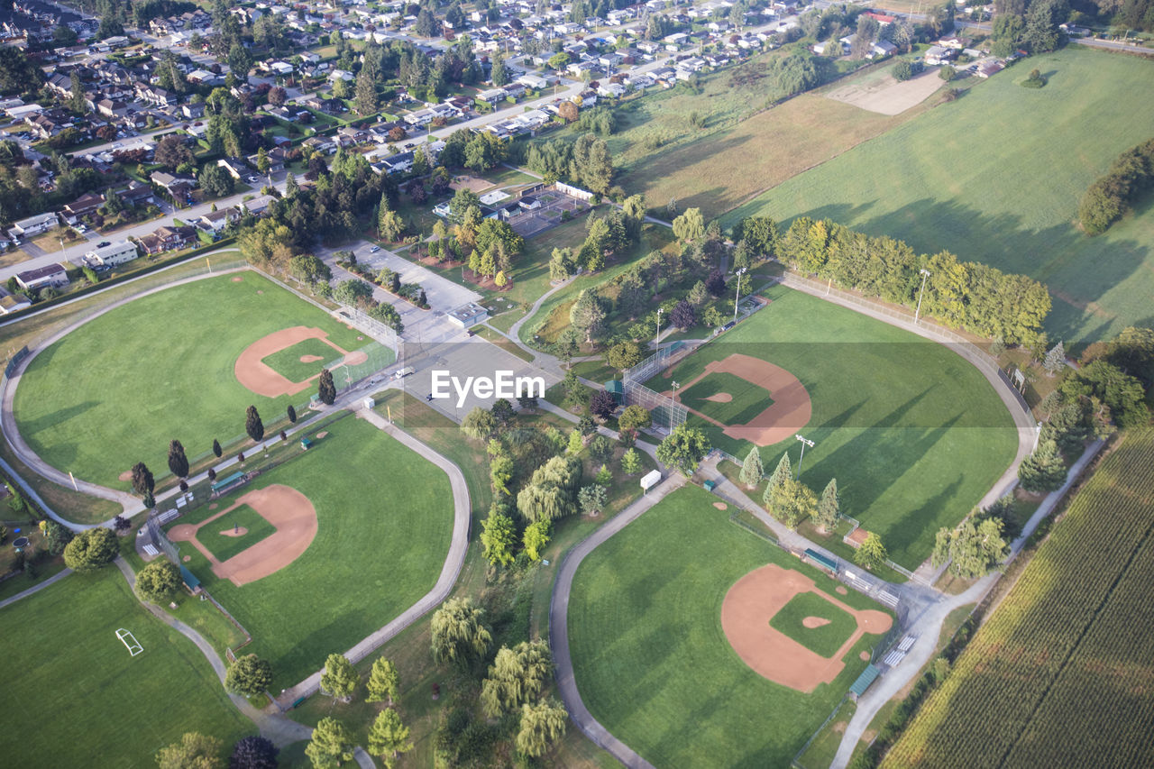 Aerial view of baseball fields and parkland.