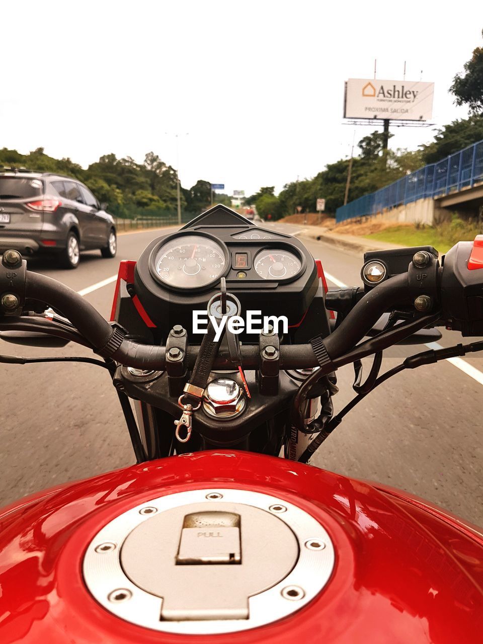 VIEW OF CAR ON ROAD