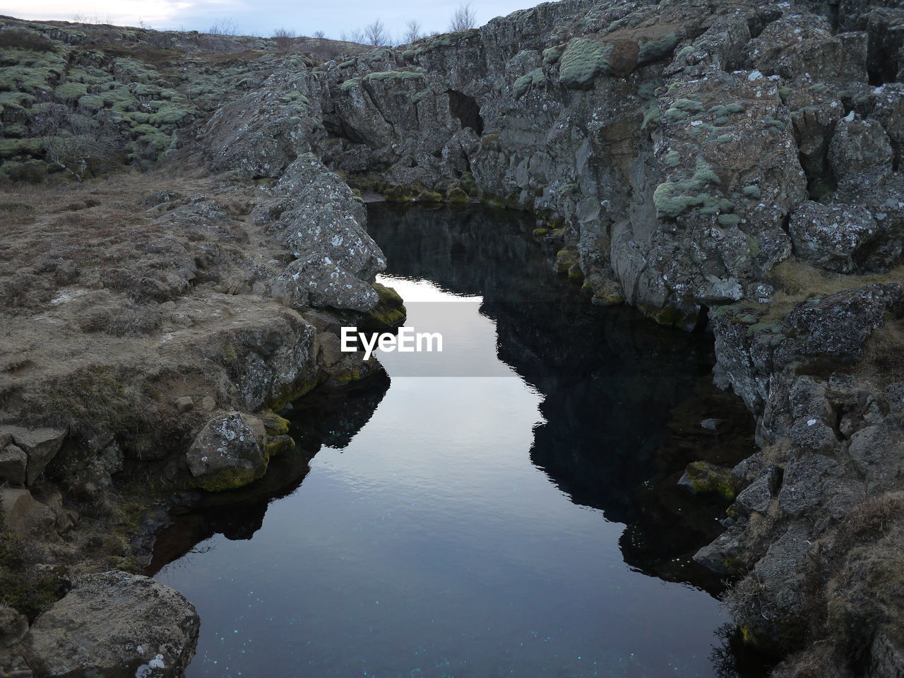 Lake amidst rock formations