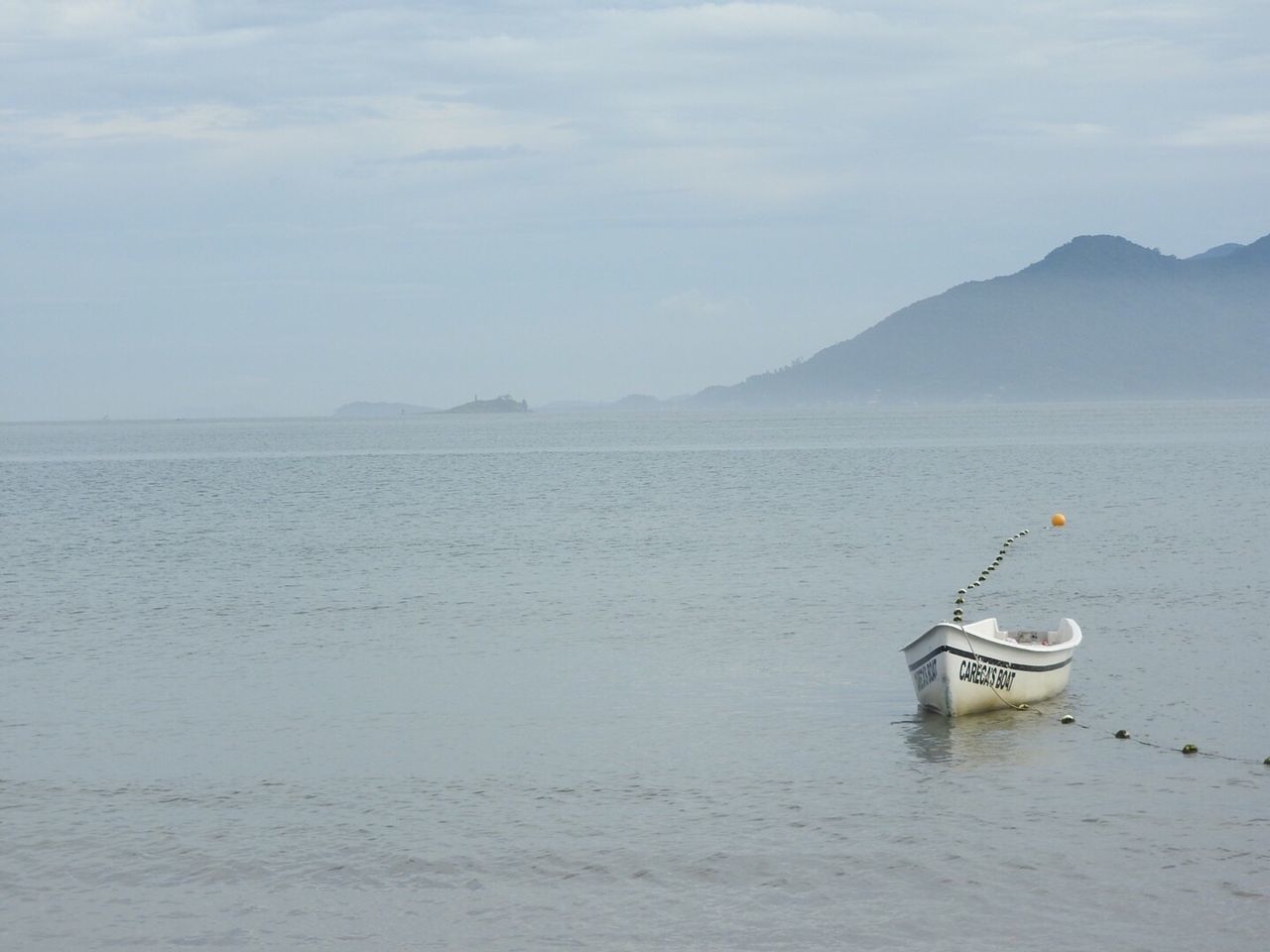 Boat on sea against sky