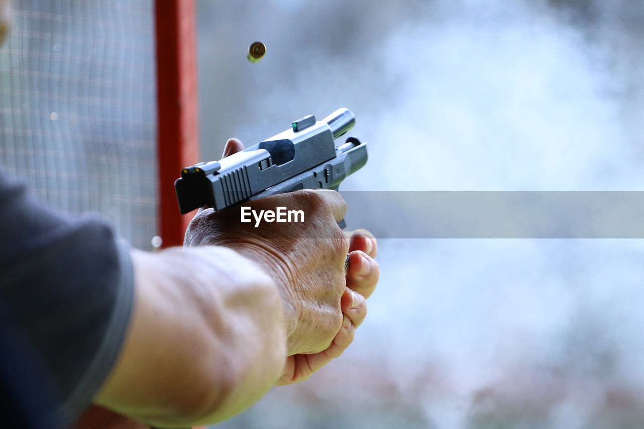 The practicing firing guns and shelling out.