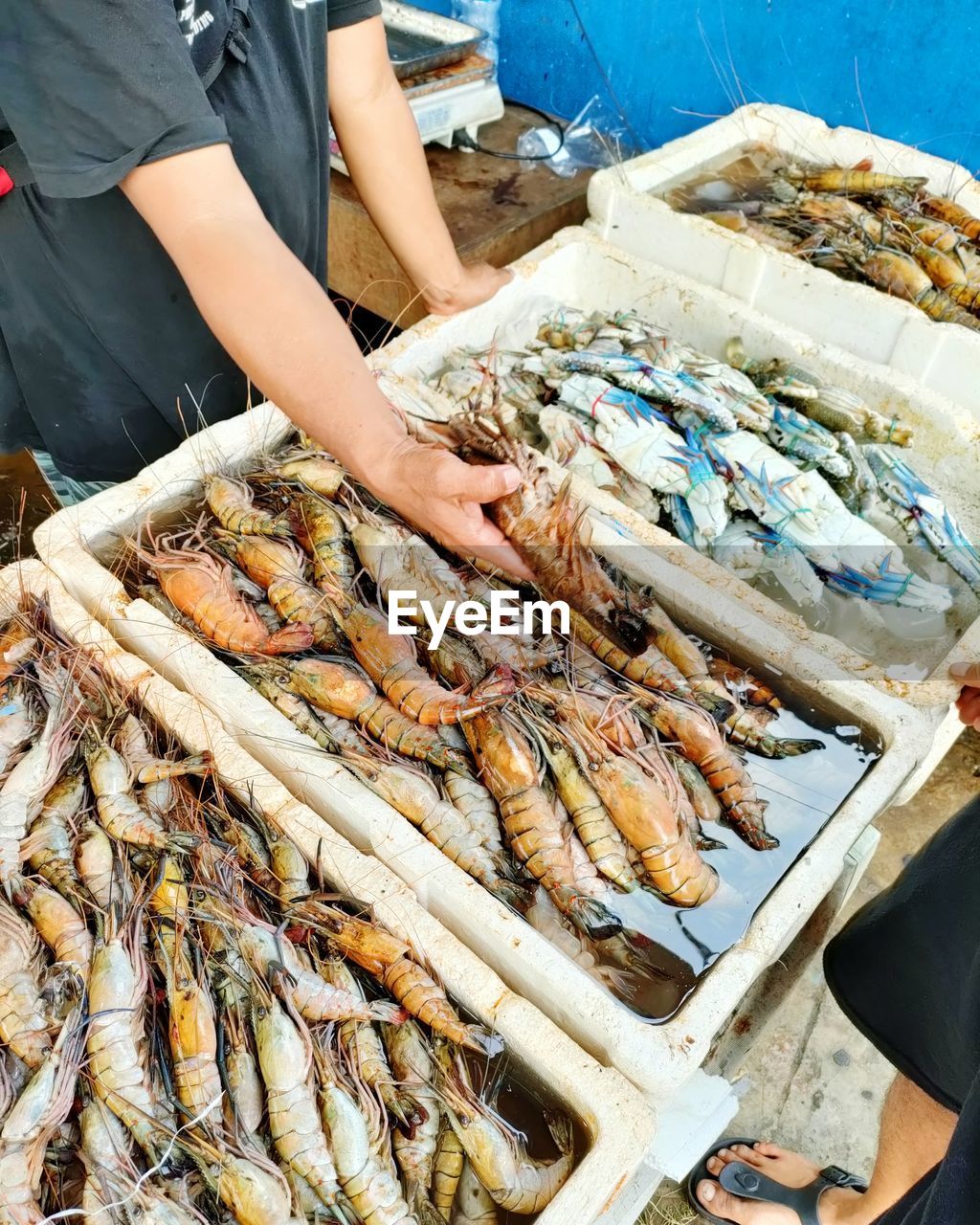 Midsection of man preparing food