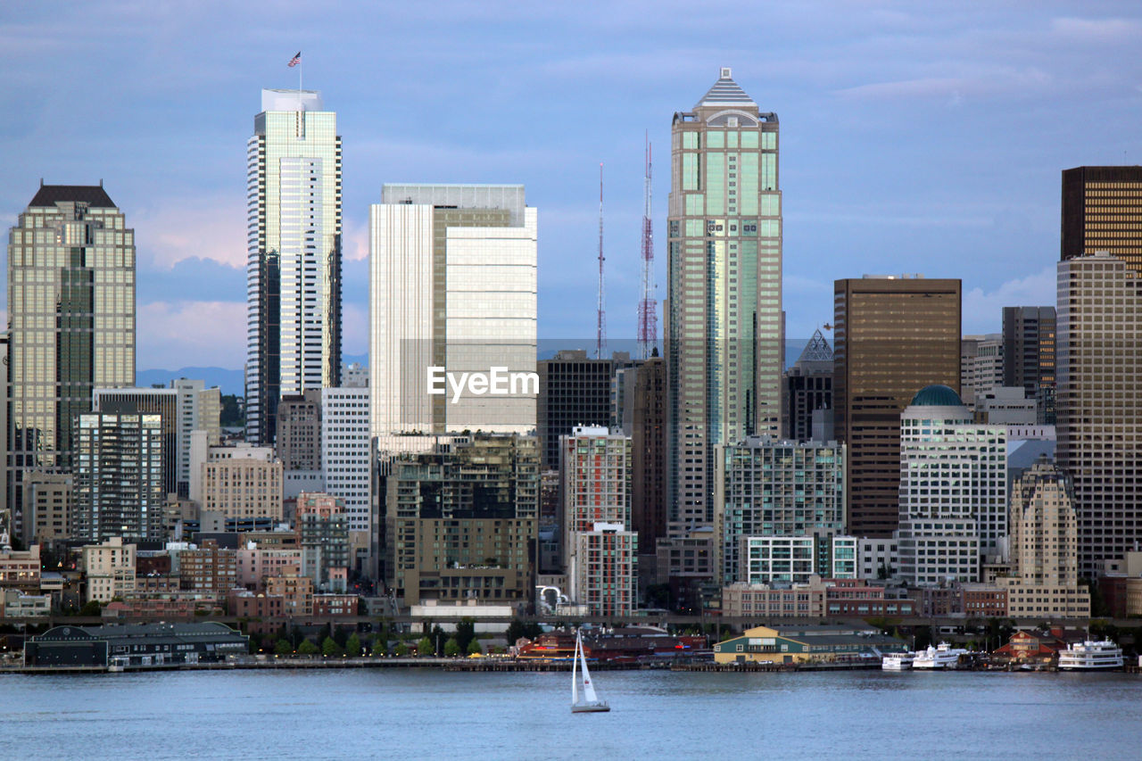 Modern buildings in city against sky