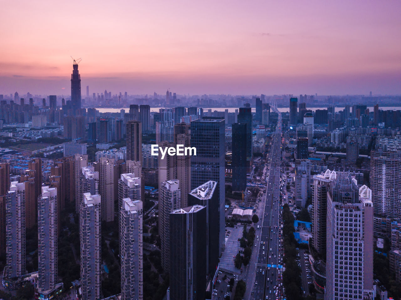 Aerial view of cityscape during sunset