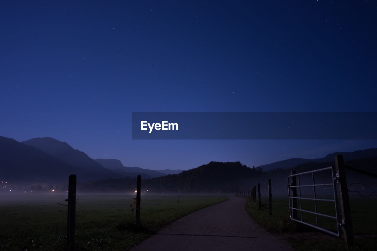 SCENIC VIEW OF MOUNTAINS AT NIGHT