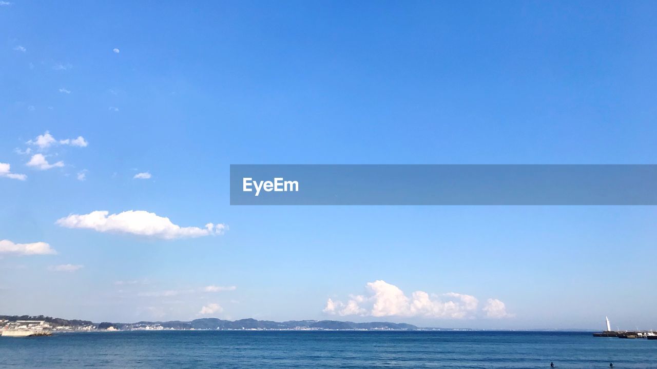 VIEW OF SEA AGAINST BLUE SKY