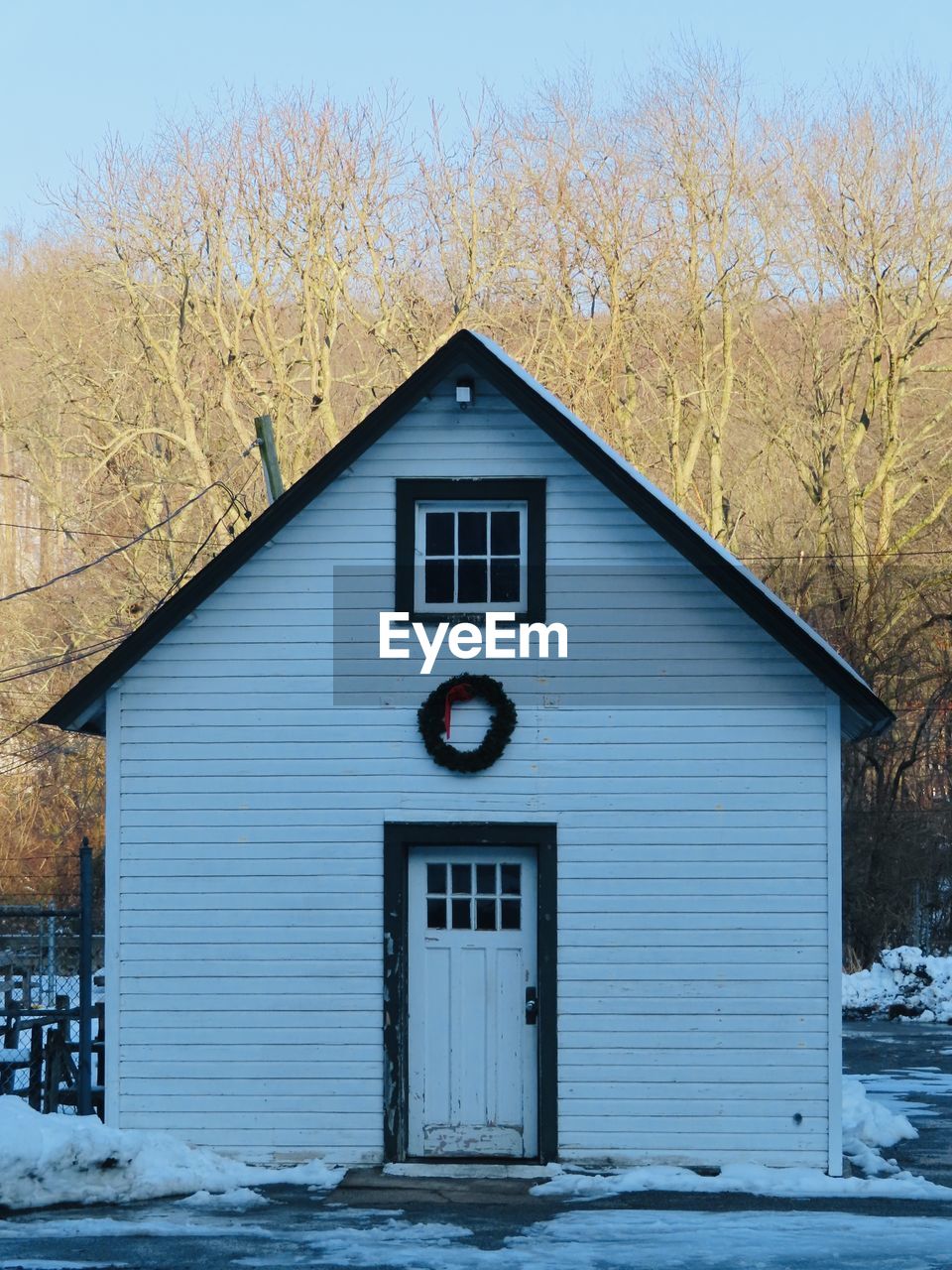 HOUSE COVERED WITH SNOW