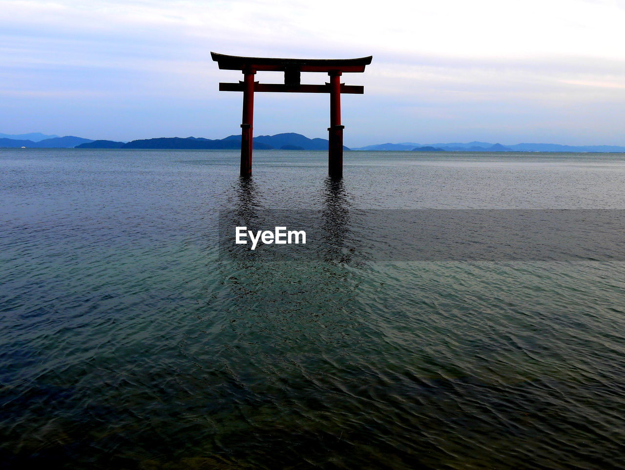 Small floating torii in lake biwa