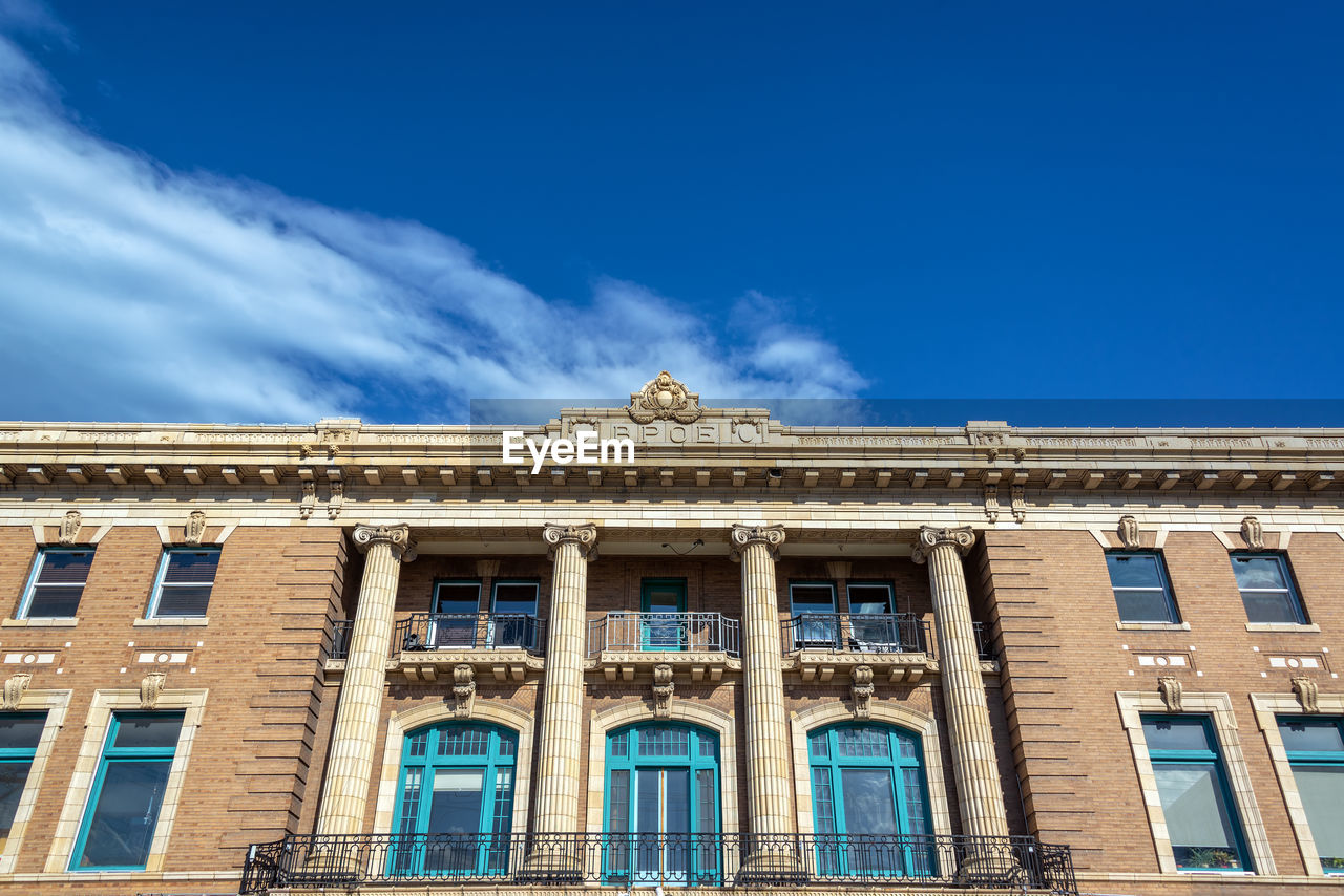 LOW ANGLE VIEW OF BUILDING AGAINST SKY