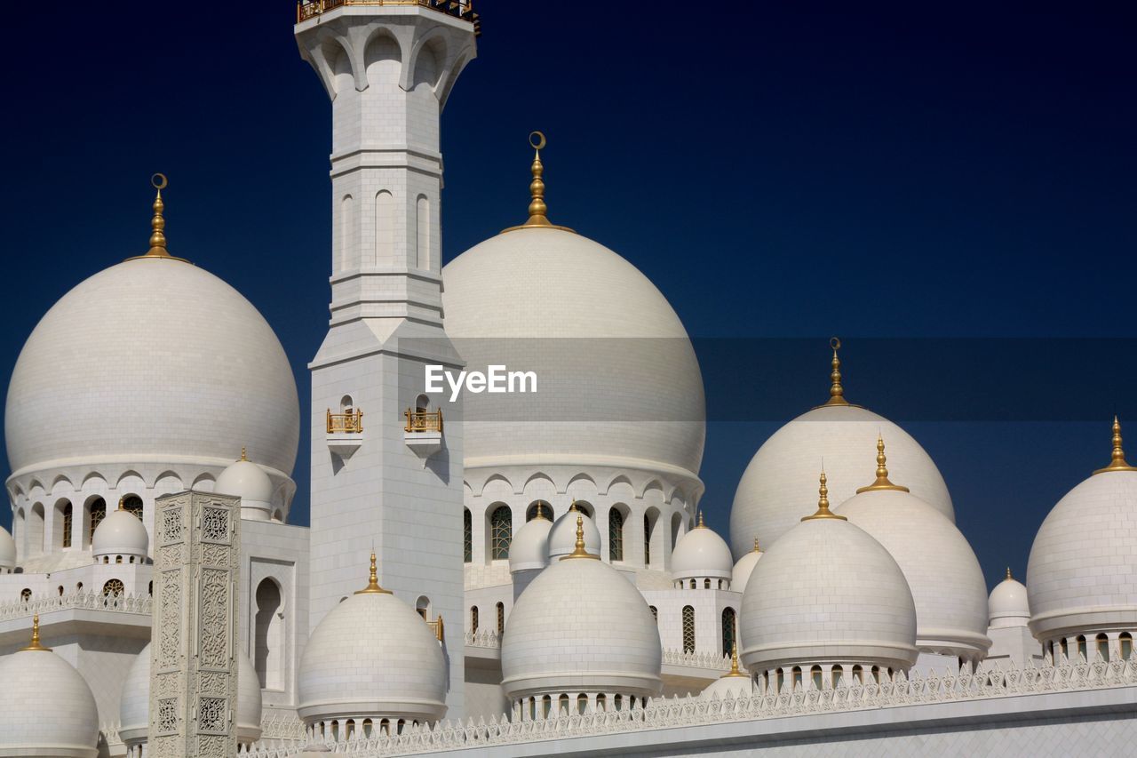 Exterior of sheikh zayed grand mosque against clear blue sky