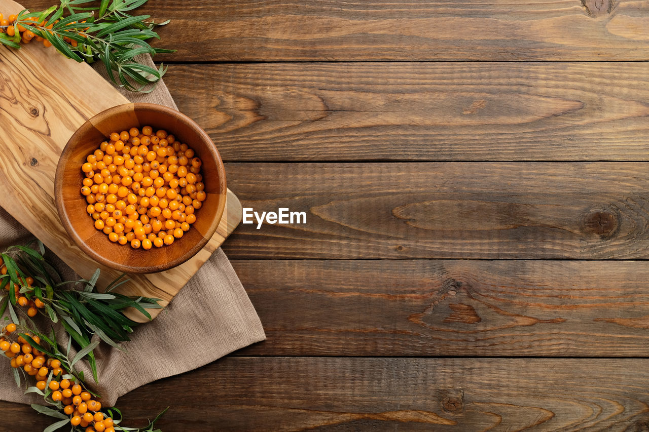 HIGH ANGLE VIEW OF FOOD ON WOODEN TABLE