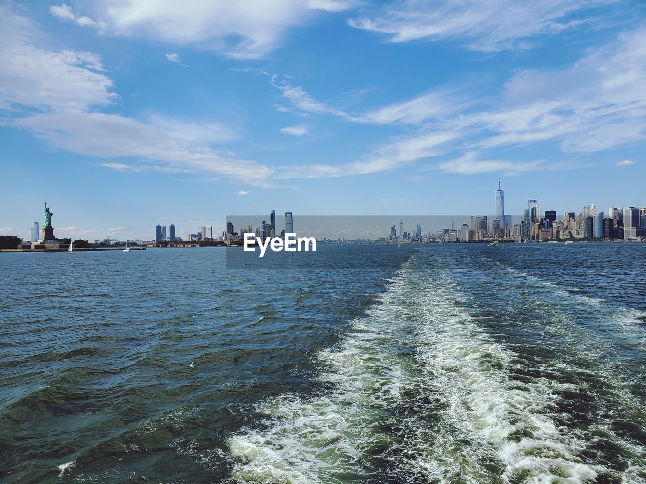 View of the statue of liberty and lower manhattan new york city 