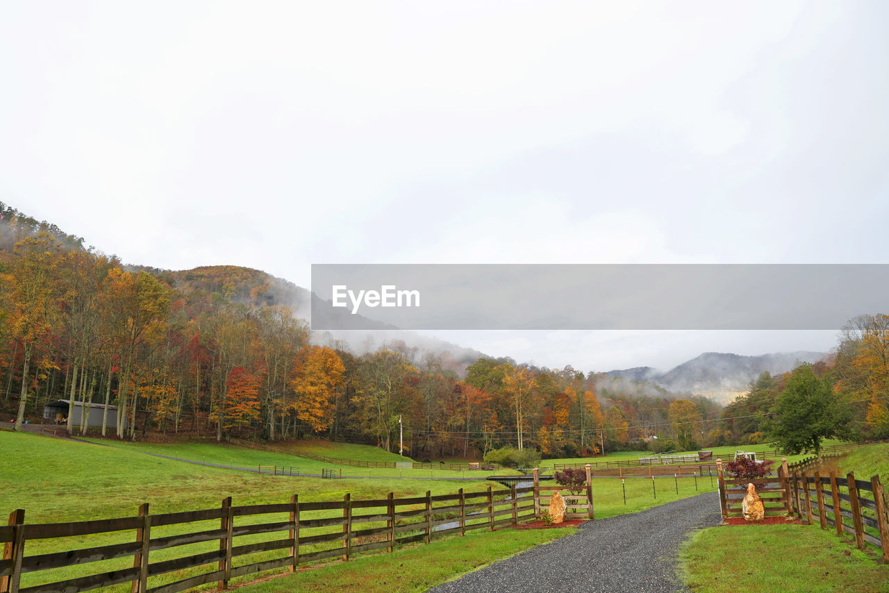 Scenic view of field against sky during autumn