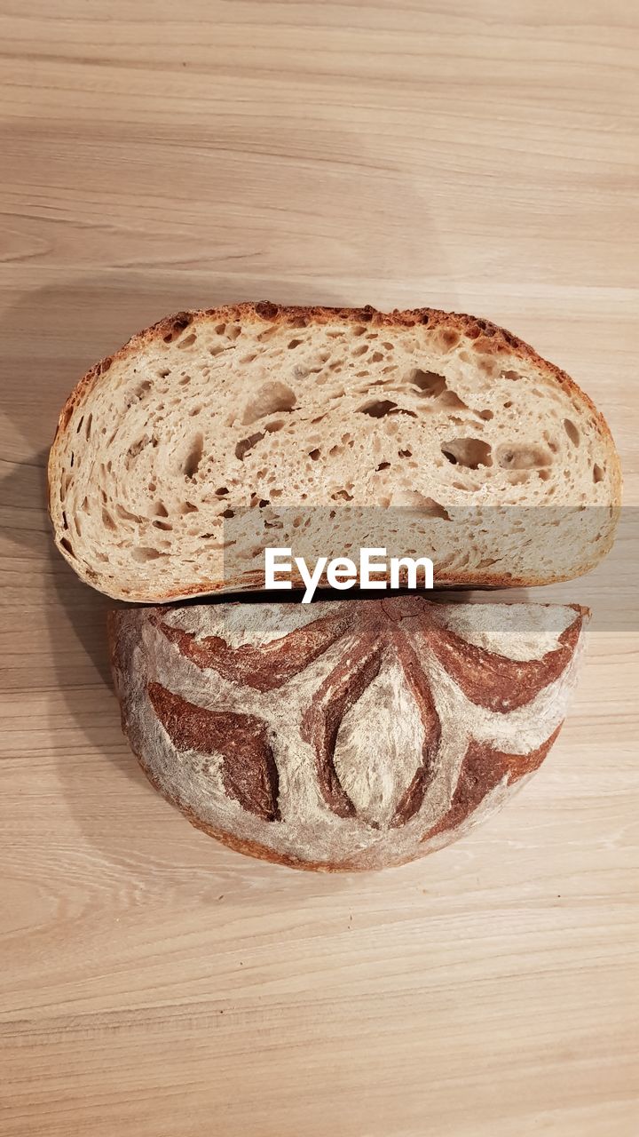 High angle view of bread on cutting board