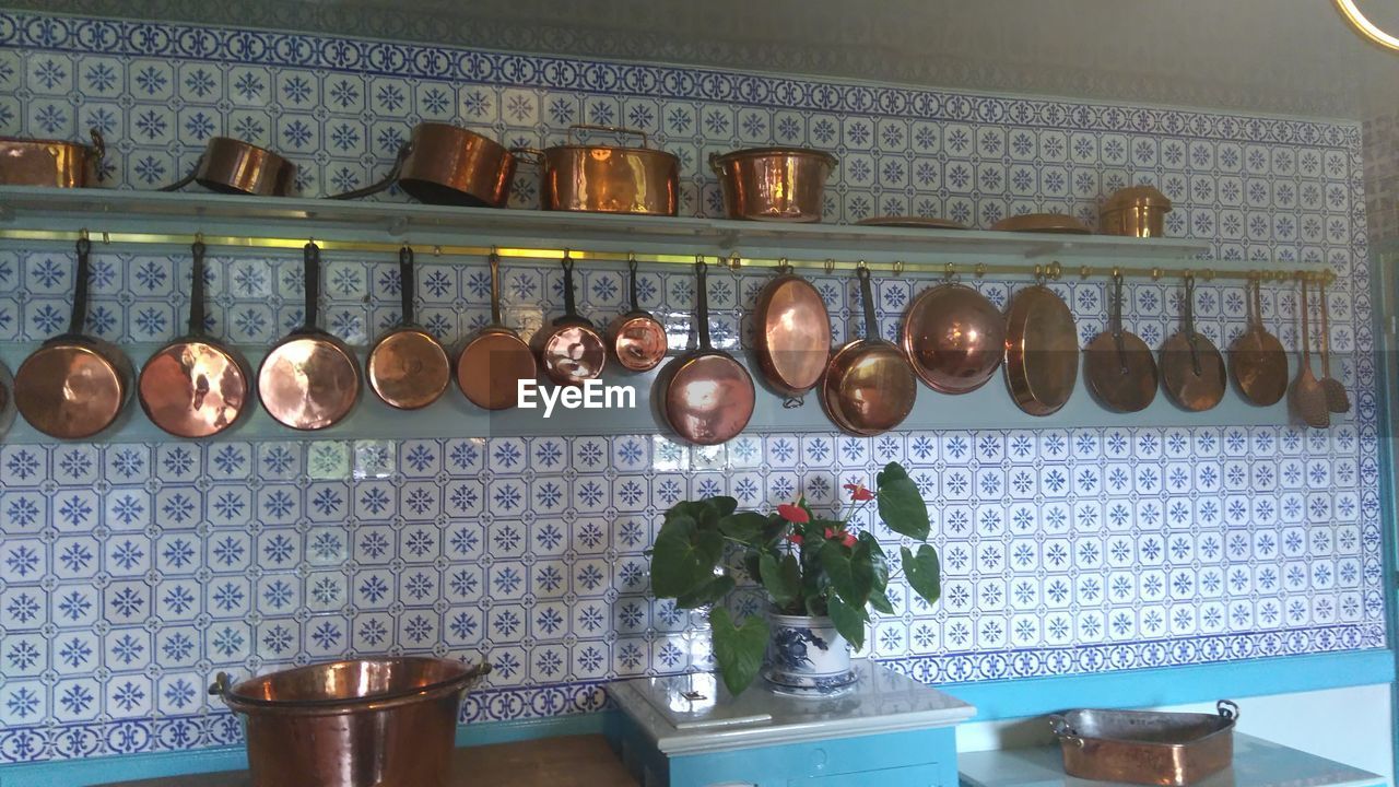 Kitchen utensils hanging at home