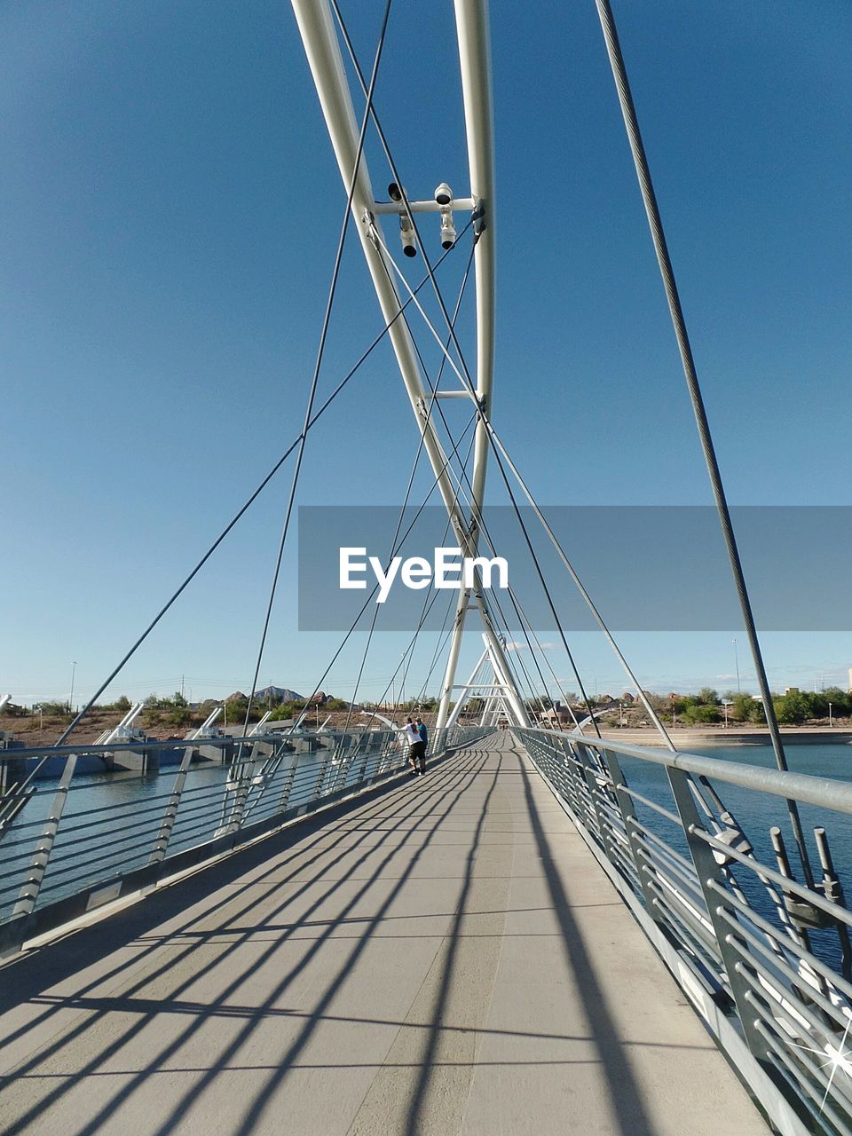 Suspension bridge against clear sky