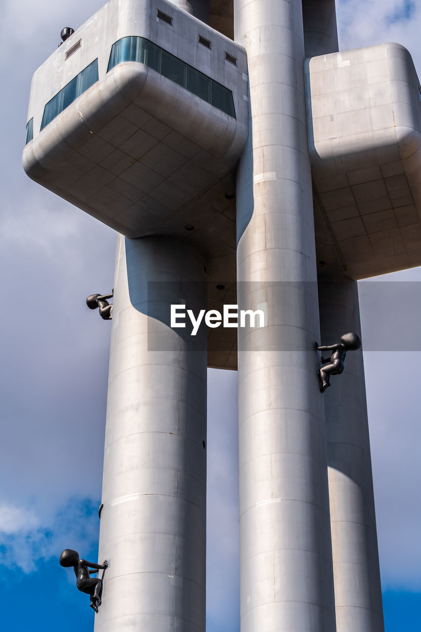 LOW ANGLE VIEW OF PIPES AGAINST SKY