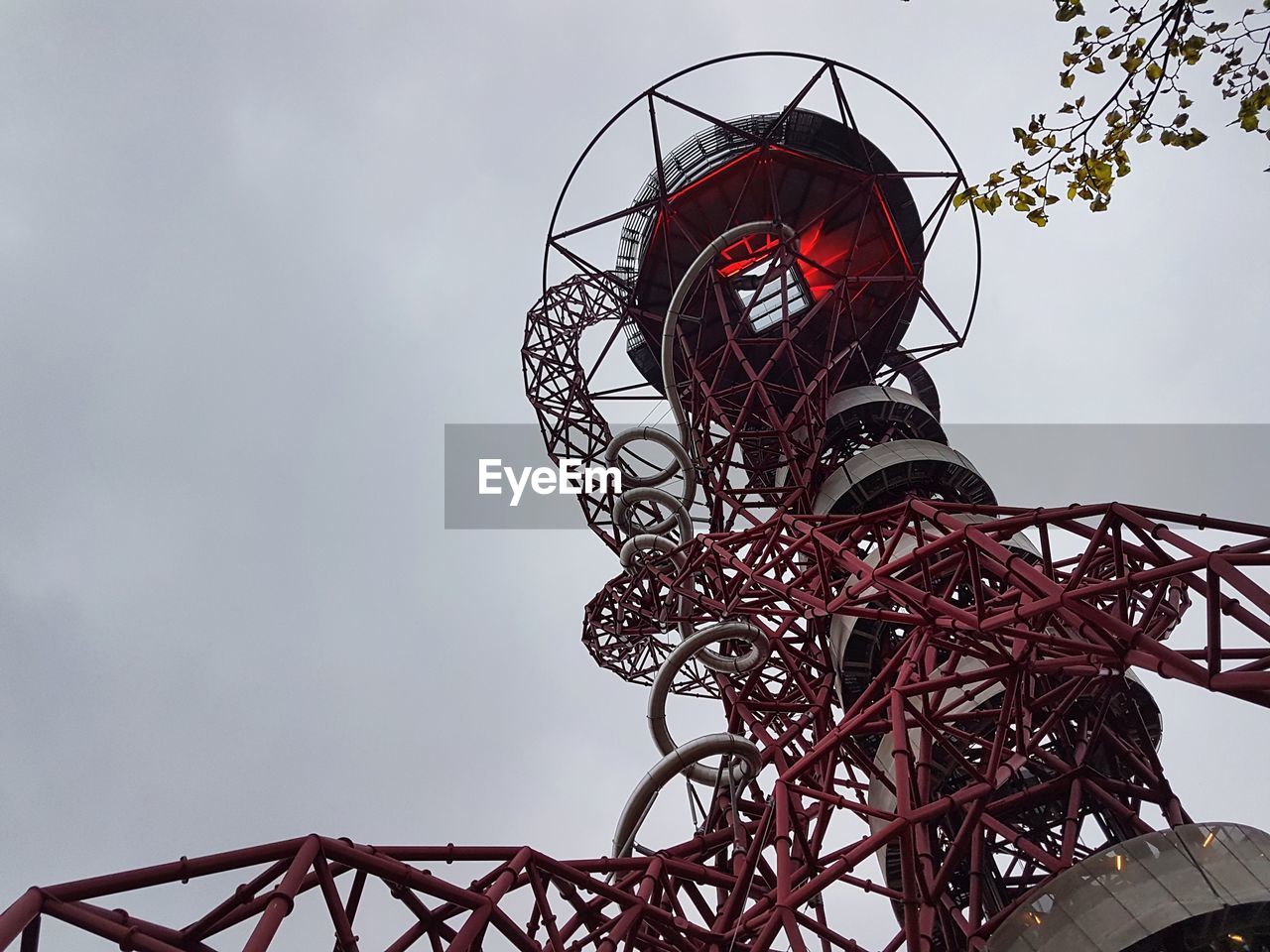 Low angle view of arcelor mittal orbit against sky