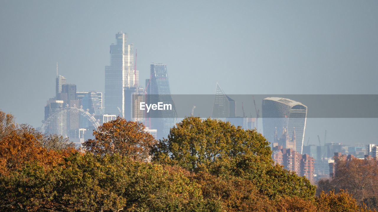 VIEW OF MODERN BUILDINGS AGAINST SKY