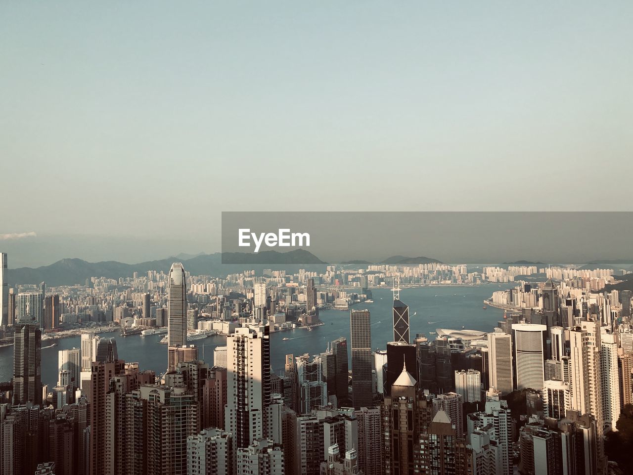 Aerial view of city buildings against sky