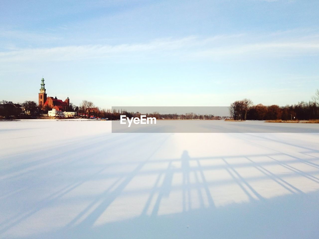 Snow covered landscape against sky