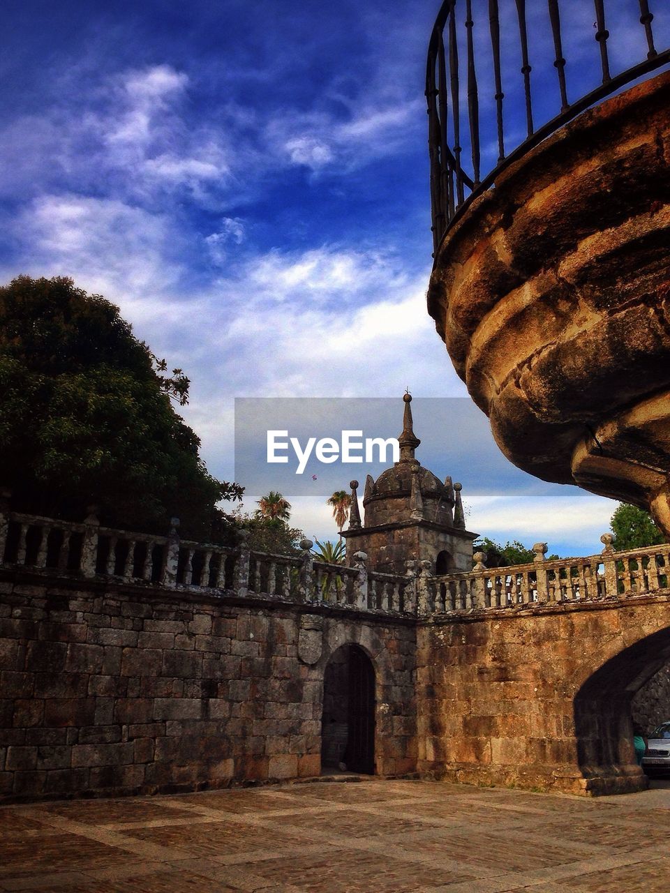 Low angle view of historic buildings against blue sky