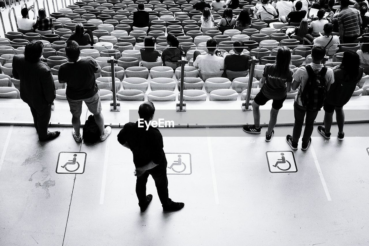 HIGH ANGLE VIEW OF PEOPLE IN SHOPPING MALL