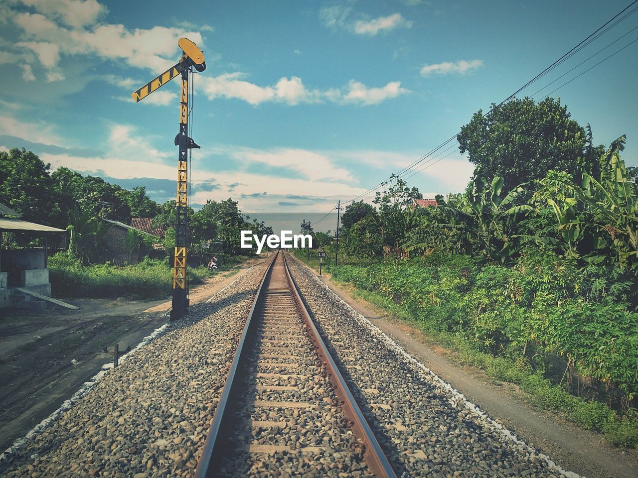 RAILROAD TRACKS AGAINST SKY