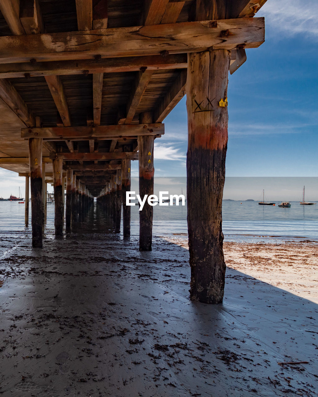 Pier over sea against sky