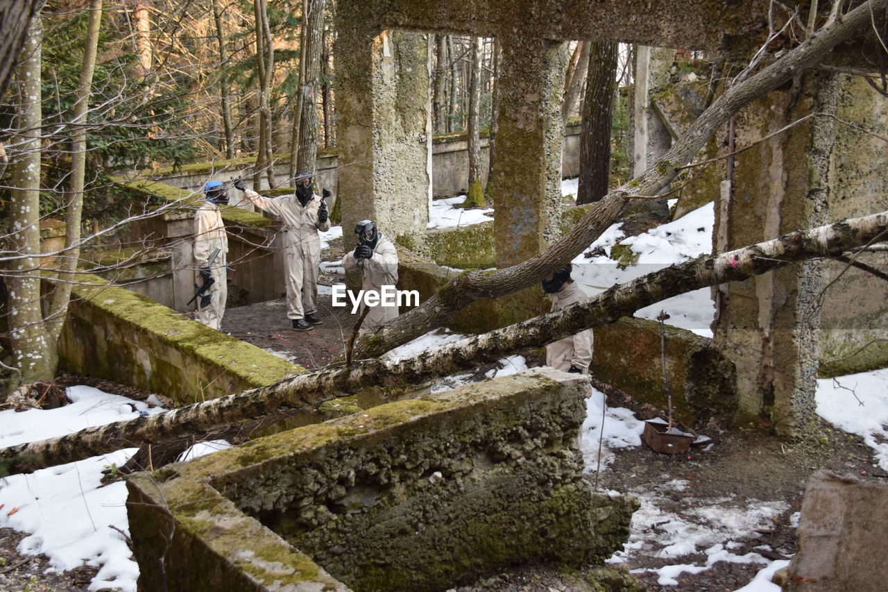 High angle view of paintball players during winter