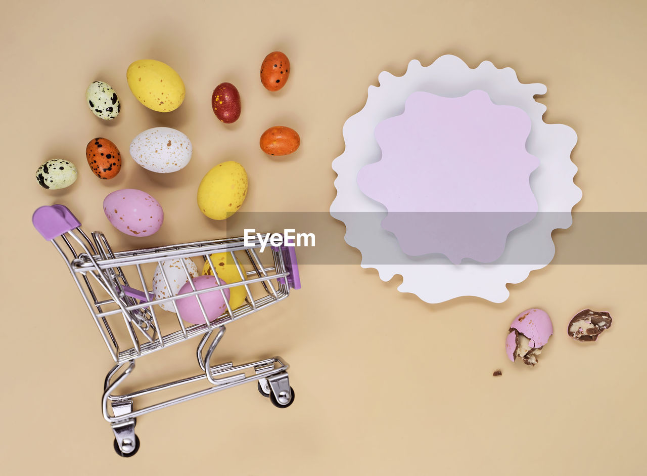 shopping cart, studio shot, food, no people, indoors, food and drink, colored background, consumerism, shopping, retail, large group of objects, variation, multi colored