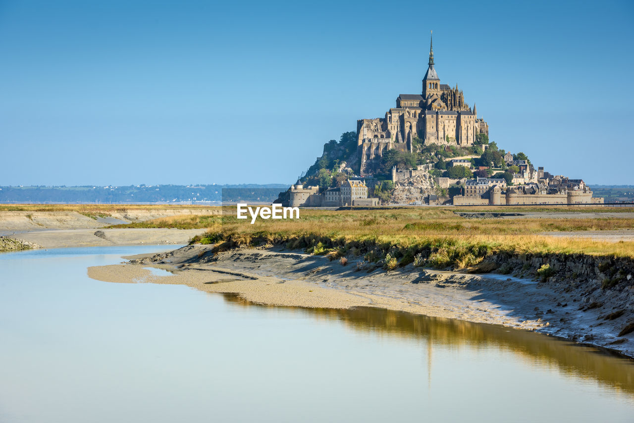 VIEW OF TEMPLE BUILDING BY WATER