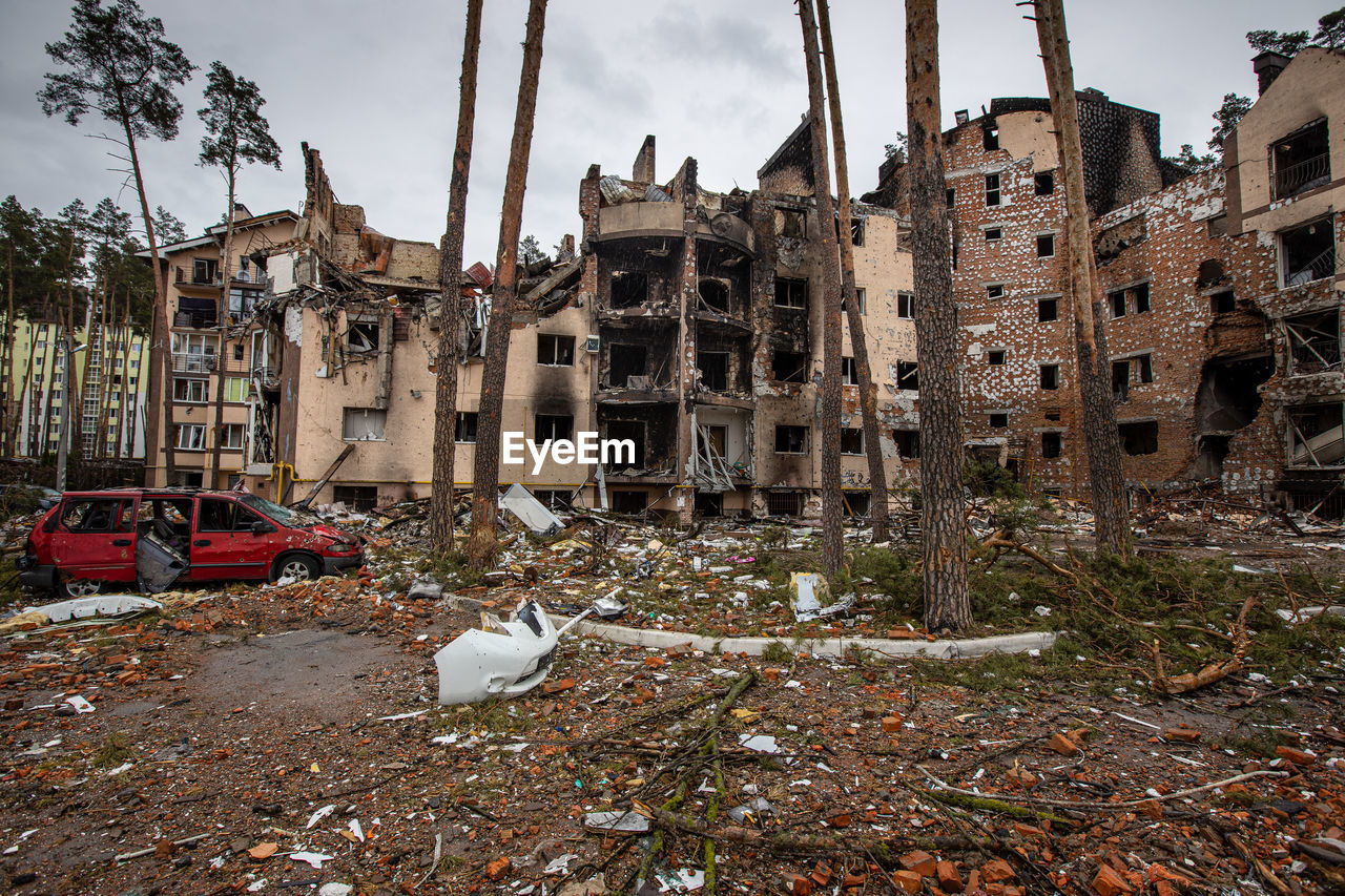 Destroyed buildings on the streets of irpen. broken, shelled windows.