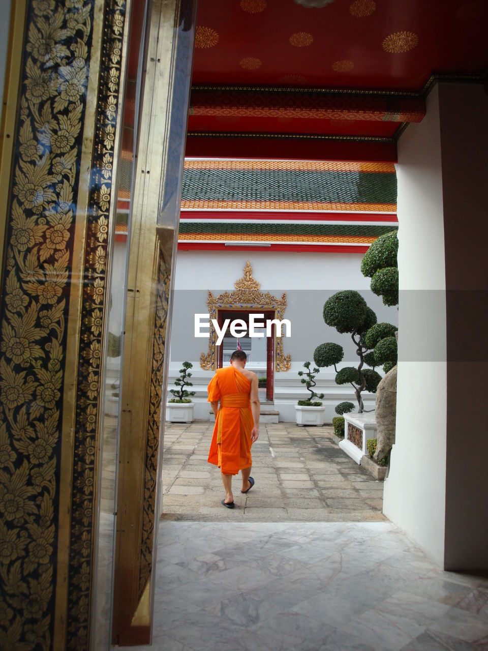 GROUP OF PEOPLE IN TEMPLE