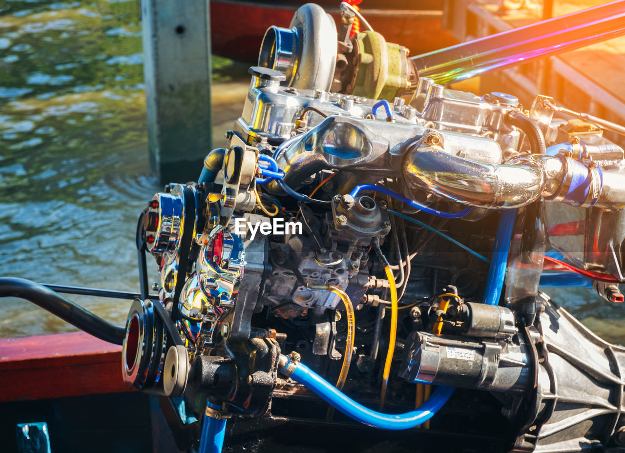 Boat engine of amphawa floating market thailand, thai style boat transportation