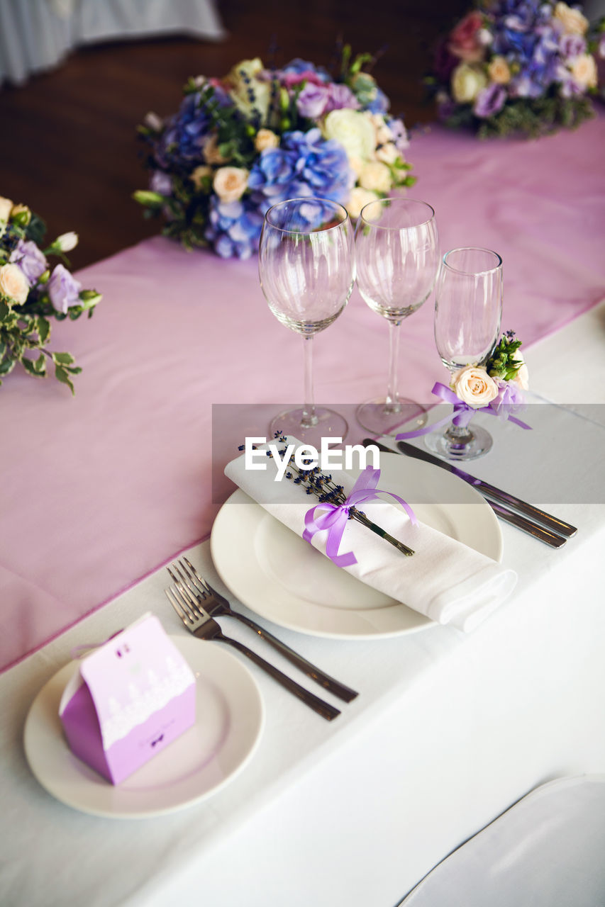Wedding purple decorations on the table with lavender