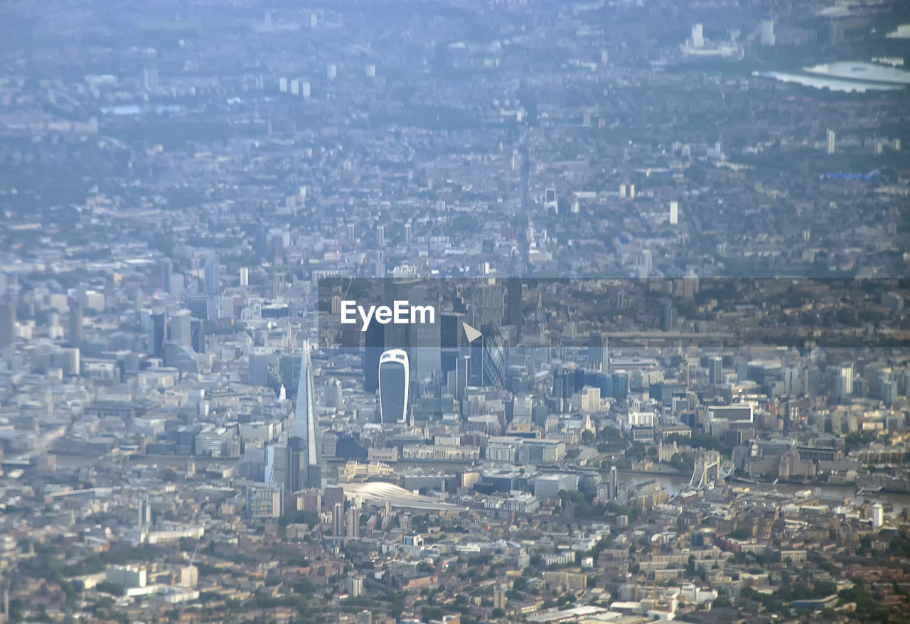 Overlooking the urban sprawl of the city of london from an airplane