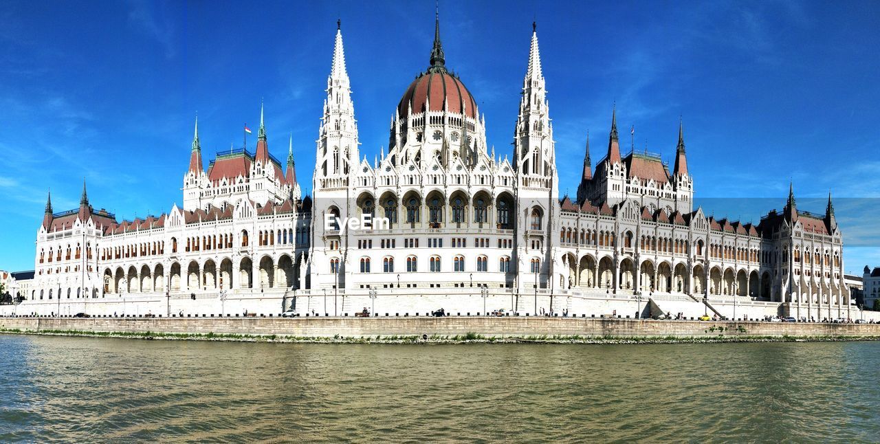 View of buildings at waterfront- budapest parliament