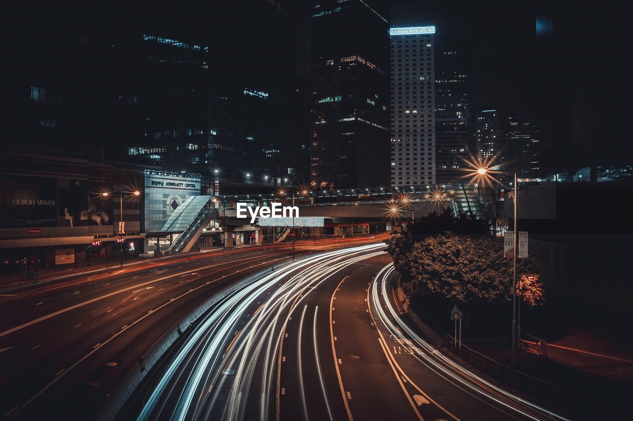 High angle view of light trails on road at night