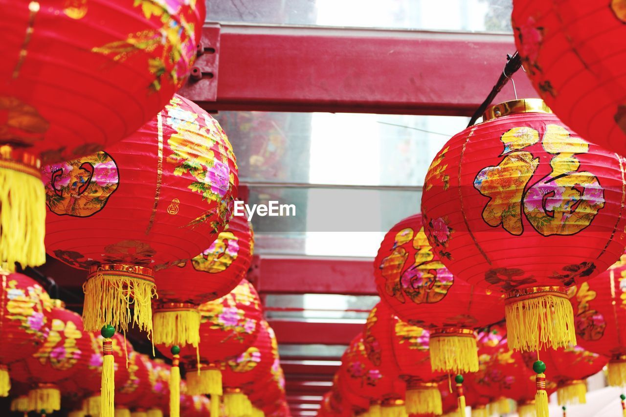 Low angle view of chinese lanterns against roof