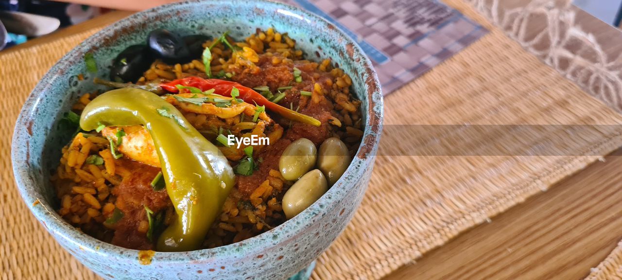 food and drink, food, healthy eating, wellbeing, vegetable, freshness, dish, bowl, produce, asian food, meal, cuisine, table, curry, no people, spice, indoors, high angle view, wood, close-up, meat, fruit