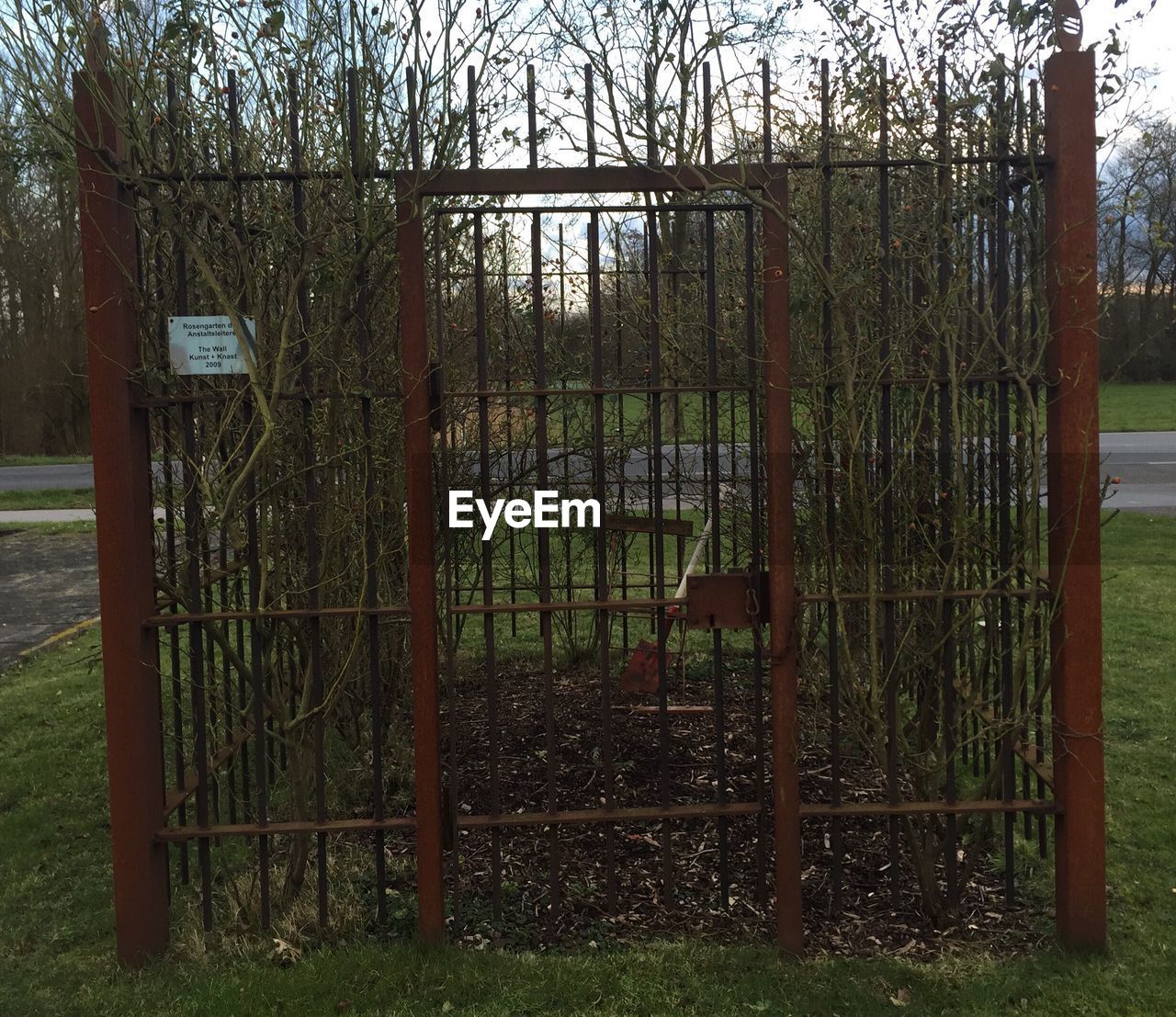 VIEW OF FENCE ON GRASSY FIELD