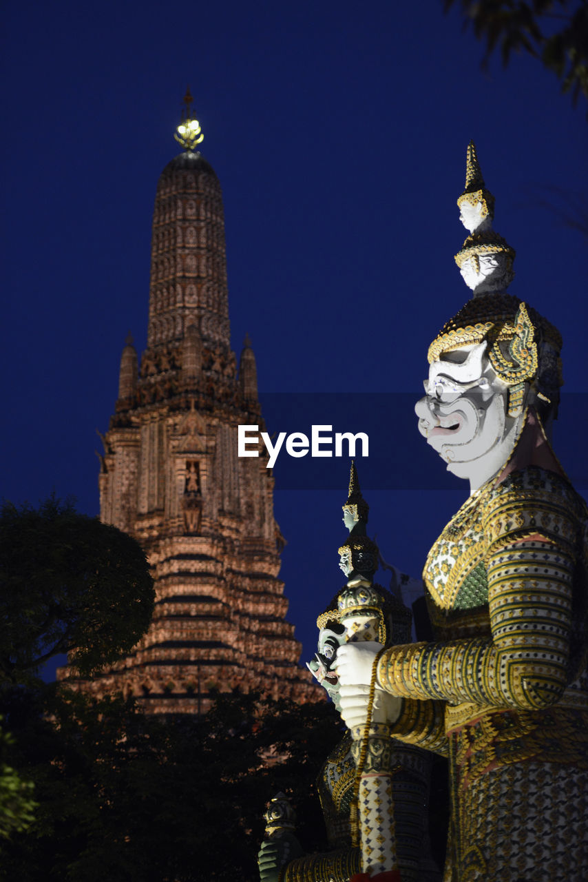 Statue of demon at wat arun temple