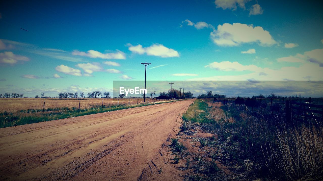 ROAD PASSING THROUGH LANDSCAPE