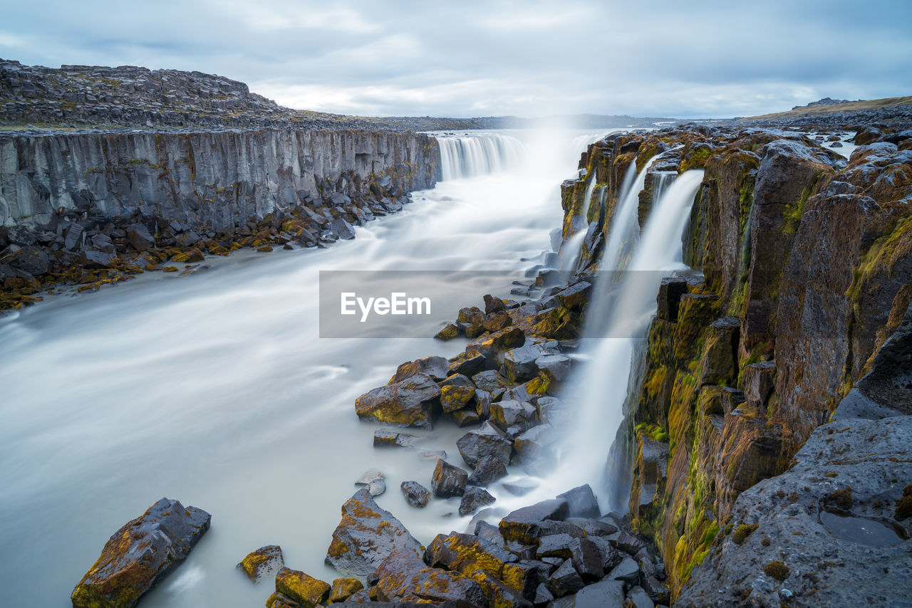 Long exposure of selfoss waterfall in iceland on a cloudy, rainy day. 